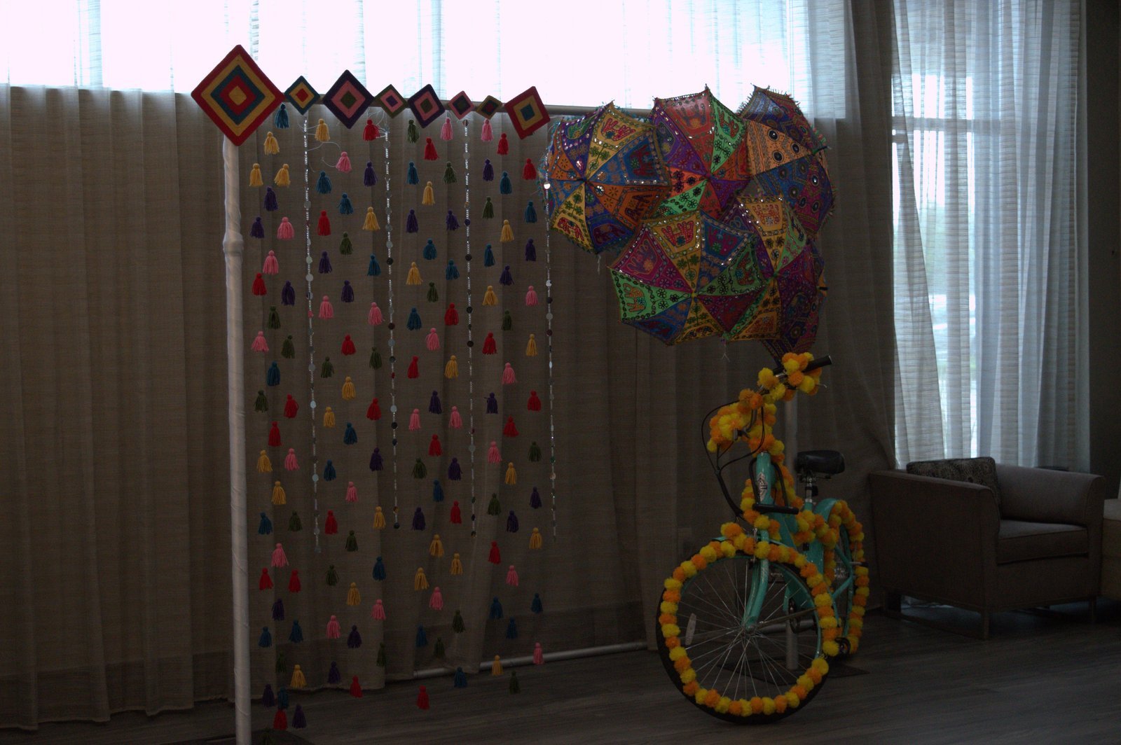 Colourful event backdrop and decorative bicycle