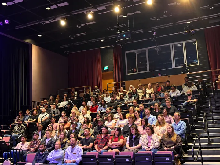 Audience members watching the Roll on the Floor stand-up night