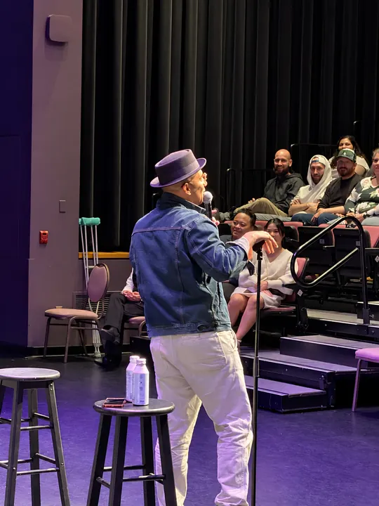 A close view of the stand-up performance beside the audience